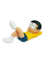 Nobita Chilling Figurine – Cute Cartoon Model for Office Desk, Home Shelf & Car Dashboard Display
