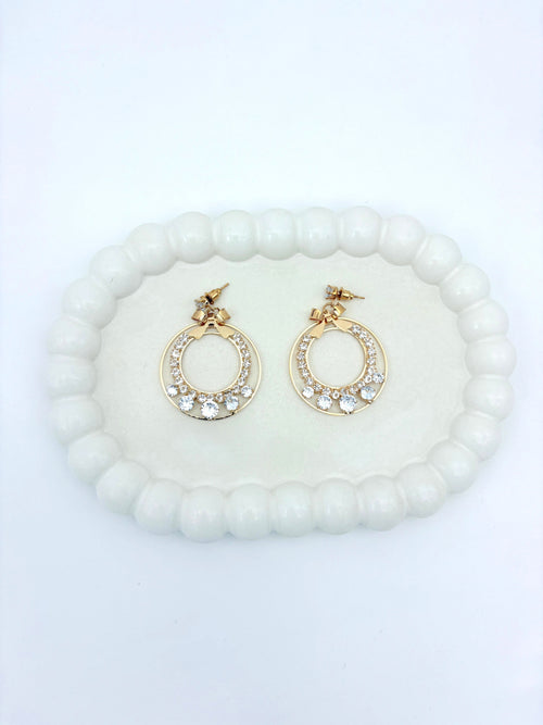 AD BOW GOLD EARRING